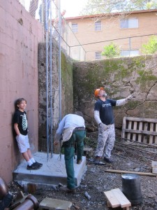 The brains of the hole, Zac and Bob, with a very happy Zephyr standing on the concrete!